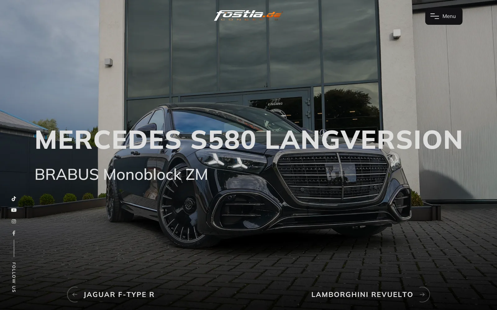 Startseite von fostla.de am Desktop: Projekt-Slider mit einer schwarzen Mercedes S-Klasse vor der Werkstatt